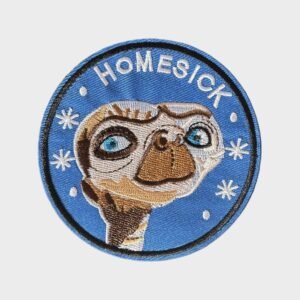 Round blue embroidered E.T. Homesick iron-on patch