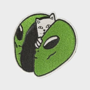 Green alien head embroidered patch with a white cat peeking out